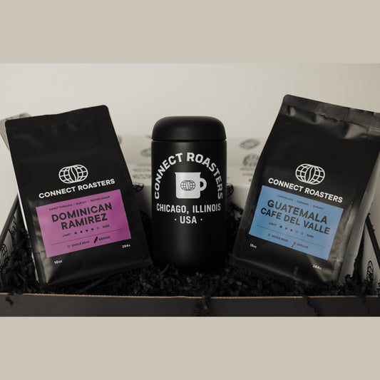 The Commuter gift box with two 10 oz bags of coffee and a Fellow Carter Move travel mug