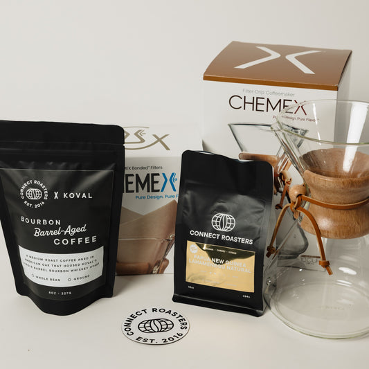 The Front Office gift with KOVAL bourbon barrel-aged coffee, a Gold Series coffee, a Chemex brewer and filters
